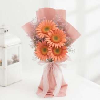 orange gerbera and gypso bouquet